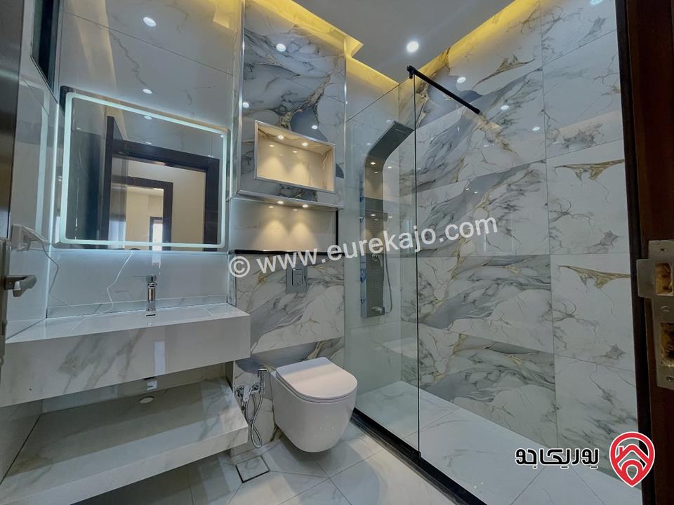 شقة جديدة فاخرة ارضية مساحة 194م + ترس 32م للبيع في عمان - طريق المطار 