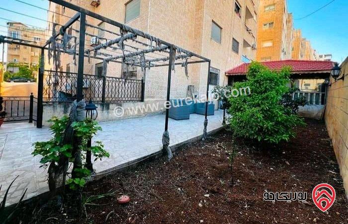 شقة فاخرة شبه ارضية المساحة الداخلية 140م والحديقة 180م مفروشة للبيع في عمان - ام السماق 