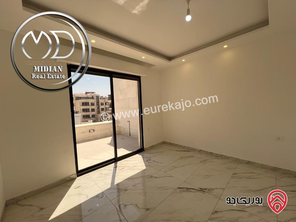 شقة دوبلكس طابق اخير مع روف للبيع في عمان - ضاحية النخيل مساحة 225م مع تراسات تشطيبات عصرية فاخرة بسعر مميز
