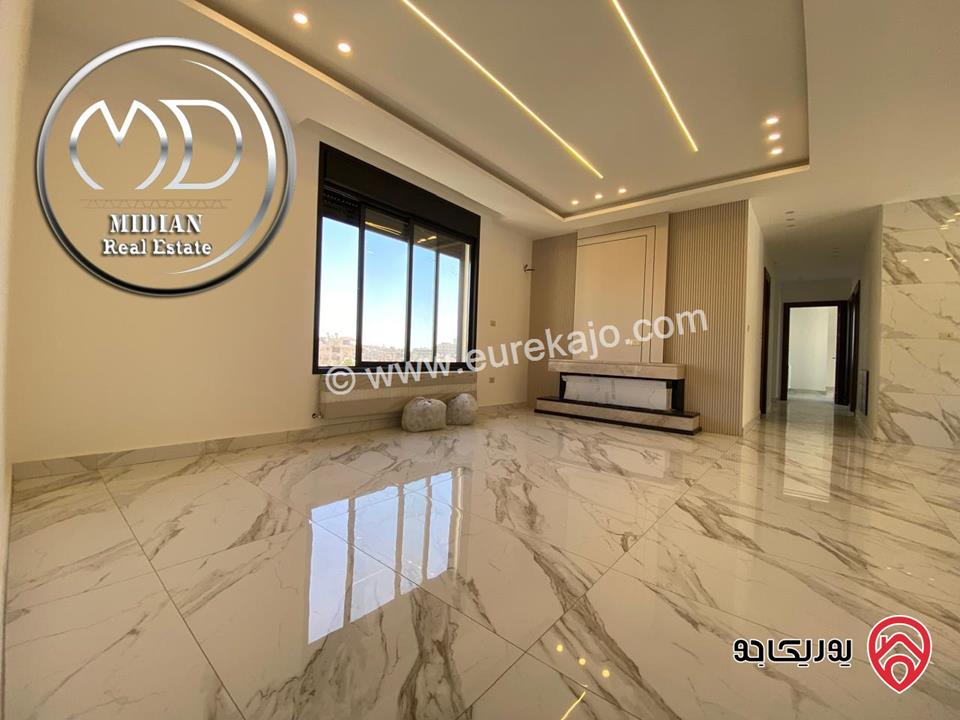 شقة دوبلكس ارضية للبيع في عمان - خلدا مساحة 315م مع ترس وحديقة 150م تشطيبات و ديكورات عصرية فاخرة جديدة لم تسكن