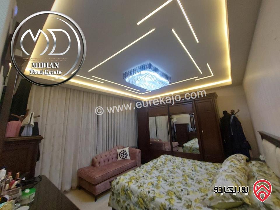 شقة ارضية للبيع في عمان - حي الصحابة مساحة 205م مع ترس و حديقة 70م تشطيبات ديكورات سوبر ديلوكس بسعر مميز