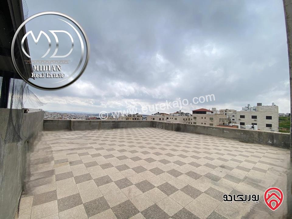 شقة جديدة للبيع في عمان - خلدا العوجانية طابق ثالث مع روف مساحة 225م تشطيبات و ديكورات سوبر ديلوكس اطلالة رائعة