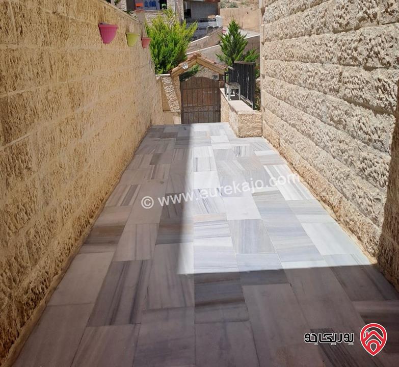شقة طابق ارضي 140م مع ترس 40م للبيع في عمان - طبربور خلف السهل الأخضر 