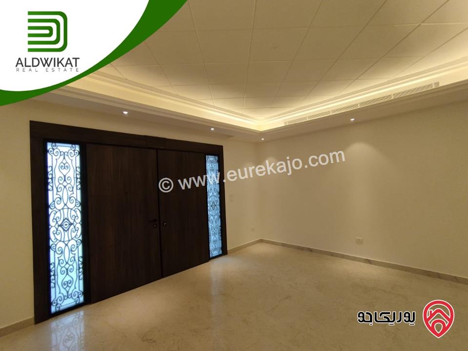 شقة للبيع في عمان - السابع قرب كوزمو طابق ارضي مساحة البناء 200م ومساحة الترس 60م