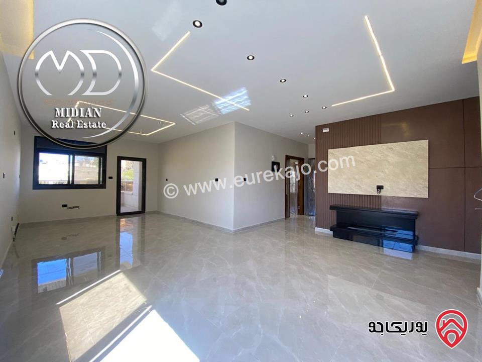 شقة ارضية جديدة للبيع في عمان - تلاع العلي مساحة 210م مع ترس و حديقة 140م تشطيبات ديكورات عصرية فاخرة بسعر مميز