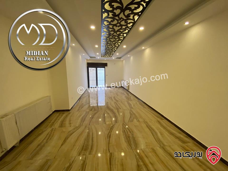 شقة شبه ارضي جديدة للبيع في عمان - طريق المطار مساحة 175م مع ترس و حديقة 100م إمكانية الأقساط بسعر مميز جداً