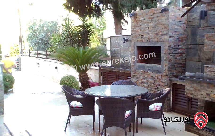 شقة أرضية مفروشة فخمة مساحة 220م مع حديقة كبيرة 350م و كراج و مدخل خاص للإيجار في عمان - الرابية