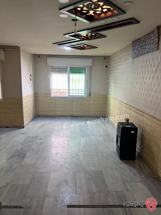 شقة شبه أرضية مساحة 100م داخلي و 100م خارجي للبيع في عمان - الجبيهة 