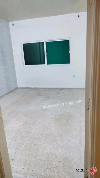 شقة طابق ثاني مساحة 85م للايجار في اربد غرب نفق الجامعة 