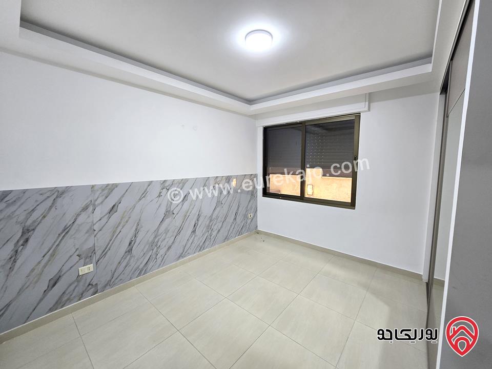 شقه شبه ارضية مساحة 100م مع ترس 50م للإيجار الفارغ في عمان - جبل عمان