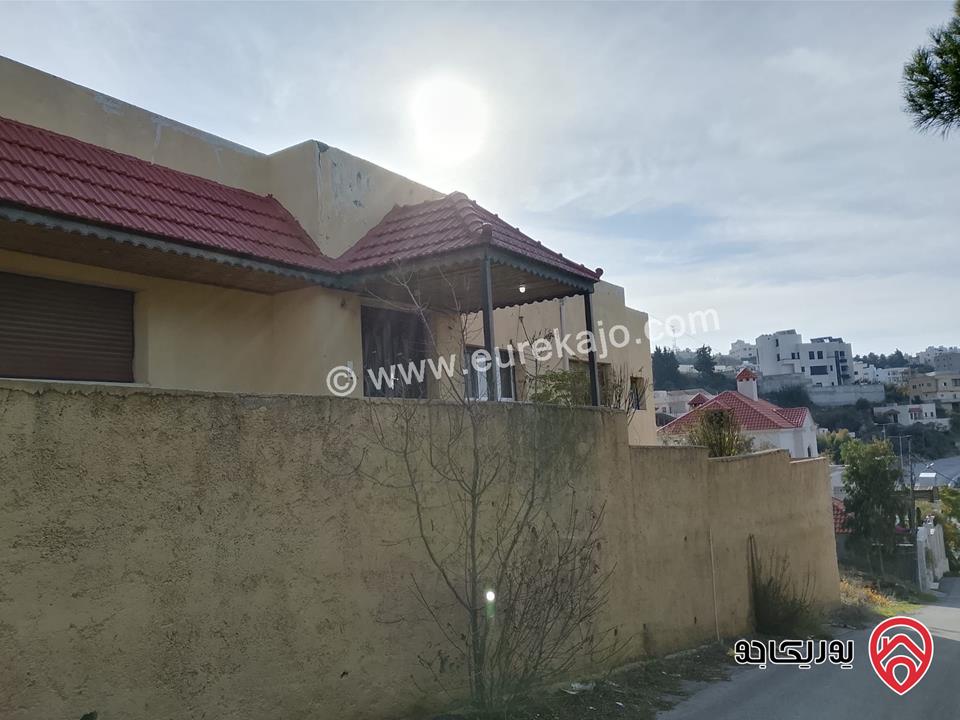 أرض مساحة 1 دونم و 211م مع بيت للبيع في عمان - منطقة بدر الجديدة