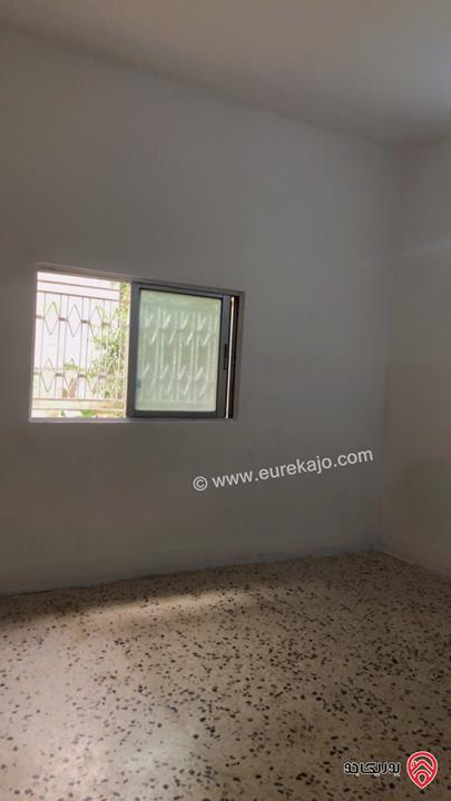 شقة أرضية مساحة 100م مدخلها مستقل للايجار في اربد قرب دوار سال الكبير شارع الهاشمي 