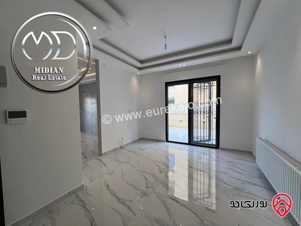 شقة ارضية جديدة للبيع في عمان - حي الصحابة مساحة 185م مع ترس و حديقة 150م تشطيبات ديكورات فاخرة و بسعر مميز