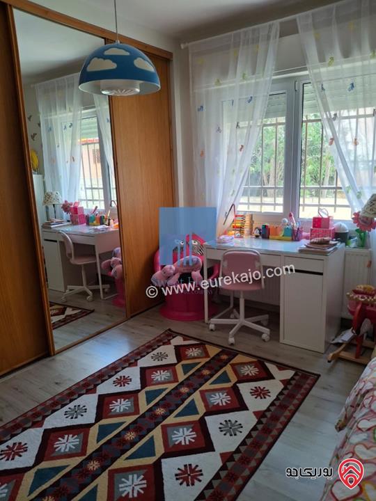 شقة أرضية فاخرة للبيع في عمان - ضاحية النخيل 186م مع ترس 70م بسعر مغري