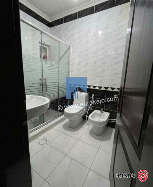 شقة أرضية مميزة للبيع في عمان - خلدا 190م مع ترس 70م تشطيب سوبر ديلوكس