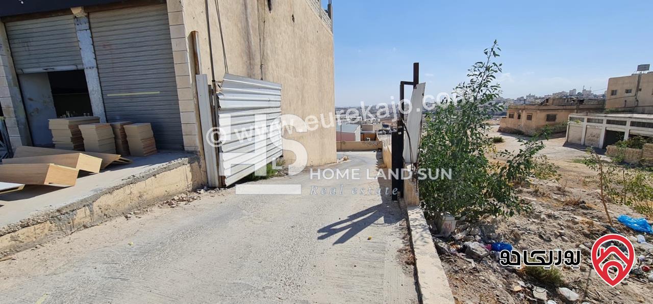 مجمع تجاري على أرض 1552م للبيع في عمان - ابو علندا ب دخل سنوي 26000 دينار