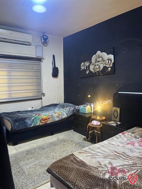  شقة أرضية مساحة 150م داخلي مع مستودع تجاري 70م للبيع في عمان – ضاحية الامير حسن