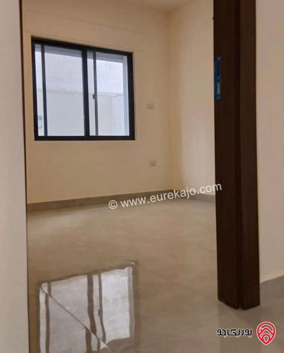 شقة طابق اول مساحة 100م للايجار في عمان - الجندويل 