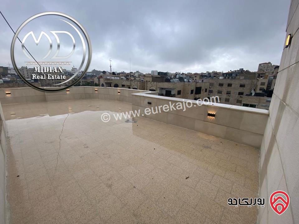 شقة دوبلكس جديدة طابق اخير مع روف للبيع في عمان - الرابية مساحة 205م مع تراسات تشطيبات سوبر ديلوكس اطلالة جميلة