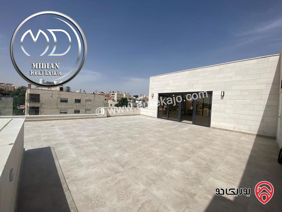شقة دوبلكس طابق اخير مع روف للبيع في عمان - ام اذينة مساحة 205م مع تراسات تشطيبات و ديكورات فاخرة اطلالة جميلة