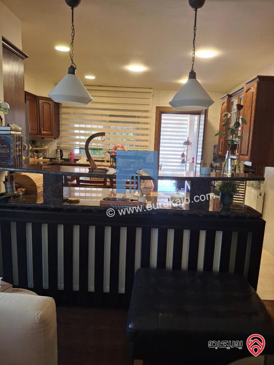 شقة أرضية فاخرة للبيع في عمان - ضاحية النخيل 186م مع ترس 70م بسعر مغري