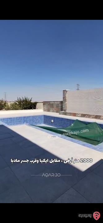 فيلا فاخرة مساحة 1 دونم على أرض 2 دونم للبيع في عمان طريق المطار مقابل ايكيا 