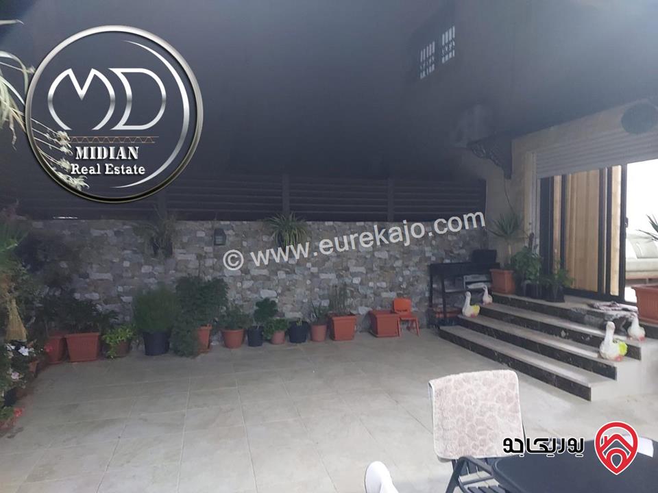 شقة ارضية للبيع في عمان - حي الصحابة مساحة 205م مع ترس و حديقة 70م تشطيبات ديكورات سوبر ديلوكس بسعر مميز