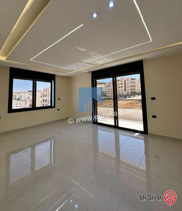 شقة فاخرة للبيع في عمان - تلاع العلي خلف طواحين الهوا طابق اول 180م تشطيب سوبر ديلوكس لم تسكن