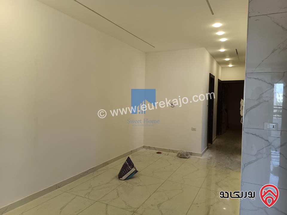 شقة فاخرة للبيع في عمان - الجندويل - قرب لارسا ومقابل شركة زين طابق اول 115م تشطيب سوبر ديلوكس لم تسكن