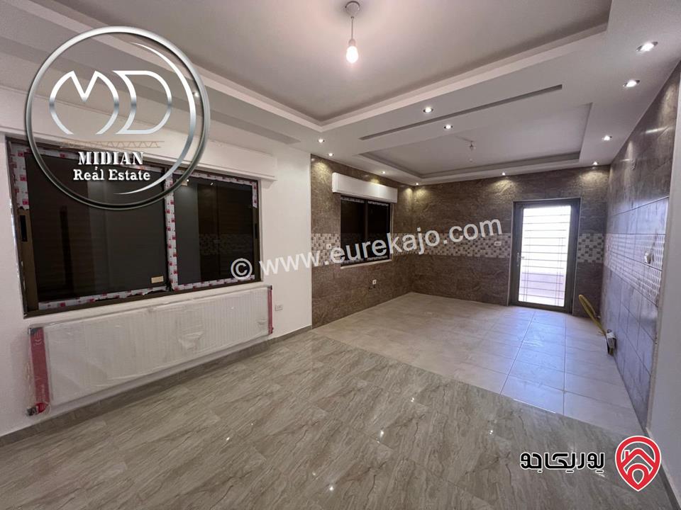 شقة ارضية جديدة فارغة للايجار في عمان - ضاحية الرشيد مساحة 150م مع ترس 50م تشطيبات سوبر ديلوكس بسعر مميز