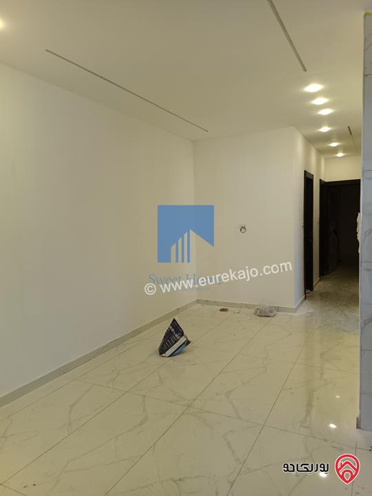 شقة فاخرة للبيع في عمان - الجندويل - قرب لارسا ومقابل شركة زين طابق اول 115م تشطيب سوبر ديلوكس لم تسكن