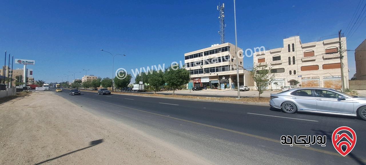 مجمع على أرض مساحة 1 دونم و 77م للبيع في عمان - طريق المطار جسر مادبا