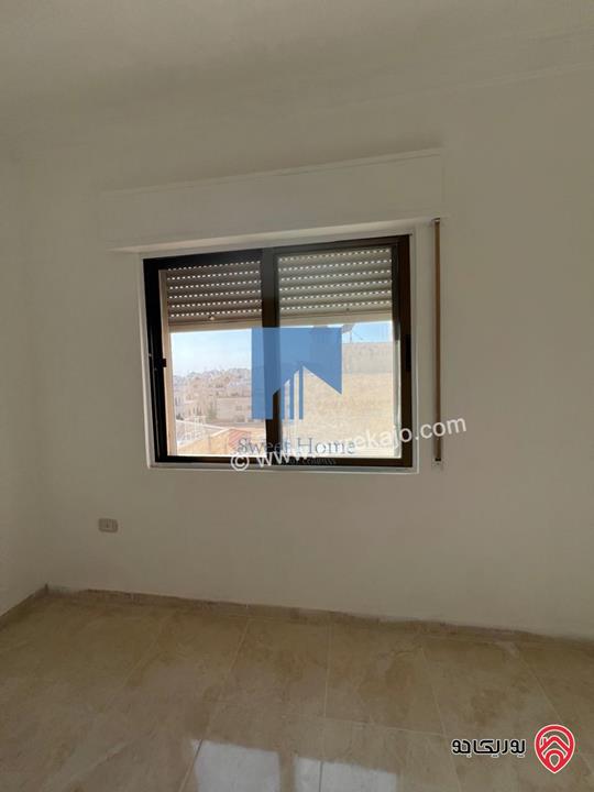 شقة مميزة طابق ثاني 75م تشطيب سوبر ديلوكس للبيع في عمان - الجندويل