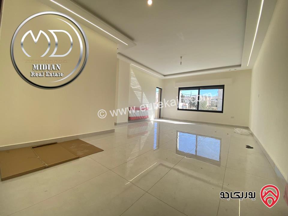 شقة ارضية جديدة فارغة للايجار في عمان - ضاحية الرشيد مساحة 180م مع ترس 30م تشطيبات ديكورات سوبر ديلوكس