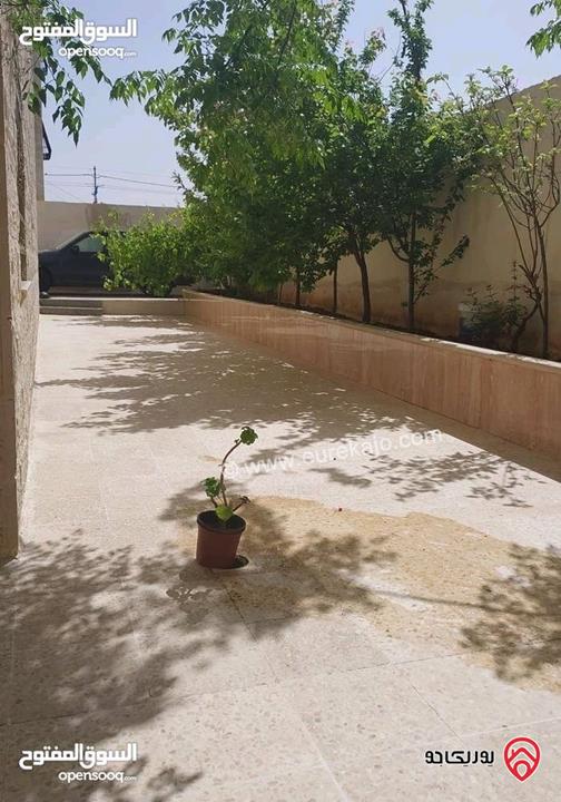 شقة شبه أرضية مساحة 133م داخلي و 140م خارجي للبيع في عمان - جبل الزهور بجانب مسجد خليل السالم