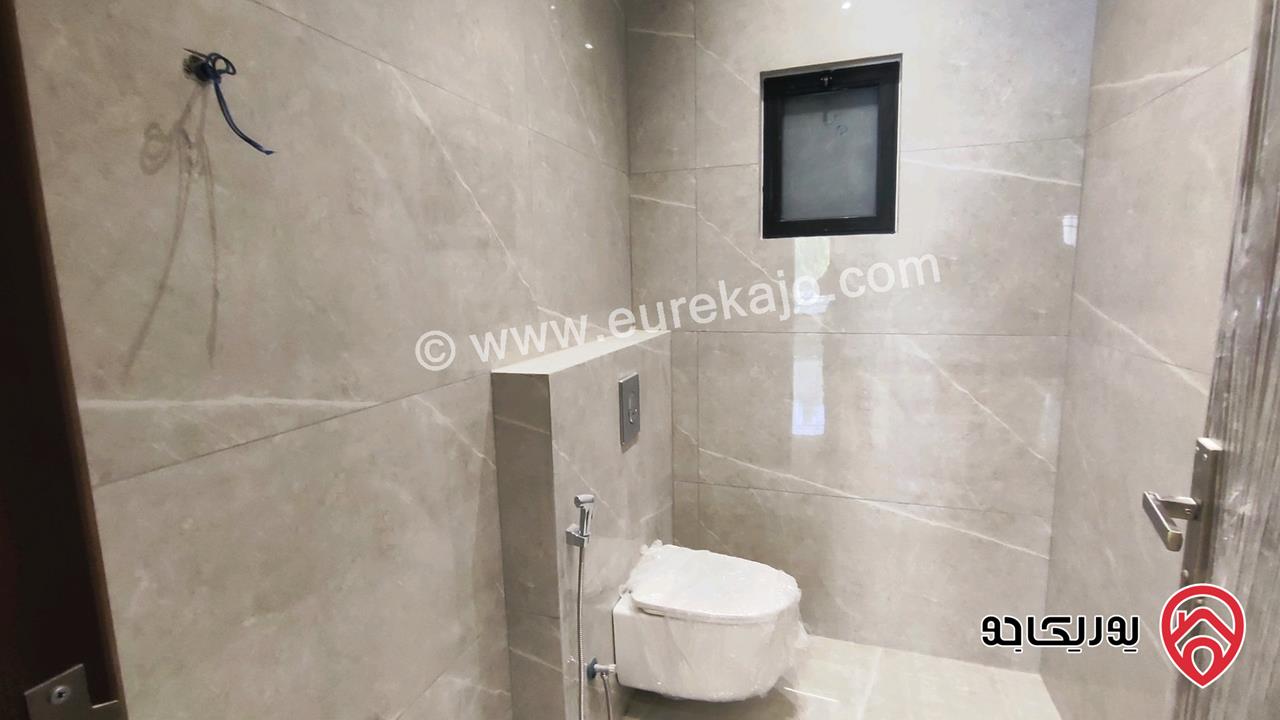 شقة ارضية جديدة مساحة 210م داخلي و 140م خارجي للبيع في عمان - تلاع العلي