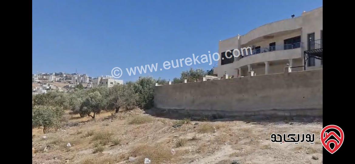 أرض مميزة مساحة 950م للبيع في عمان - مرج الحمام البحاث على شارعين سكن أ مطلة