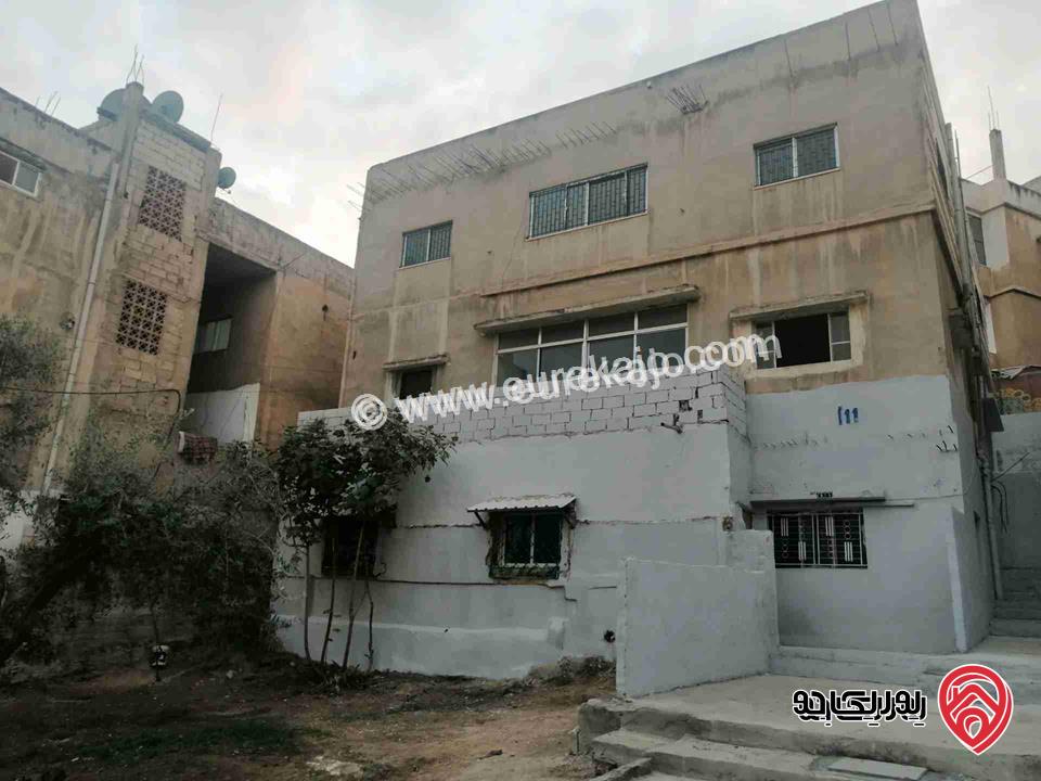 عمارة مساحة 438م على أرض 475م للبيع في عمان - الجبل الاخضر حي نزال