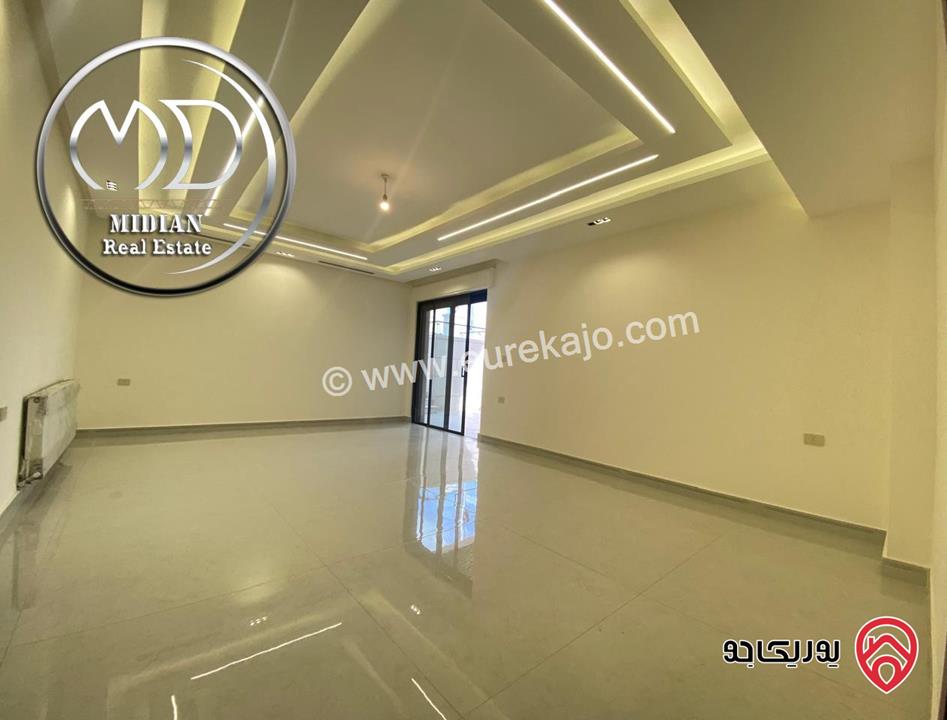 شقة جديدة شبه ارضي فارغة للايجار في عمان - دابوق مساحة 200م مع تراسات 150م تشطيبات وديكورات عصرية فاخرة