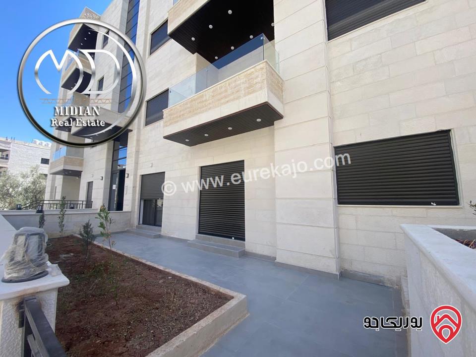 شقة شبه ارضي جديدة للبيع في عمان - تلاع العلي مساحة 200م مع ترس و حديقة 150م تشطيبات سوبر ديلوكس بسعر مميز جداً