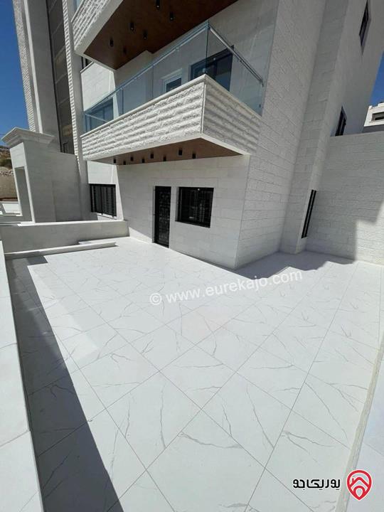 شقة فاخرة جديدة ارضية مساحة 188م داخلي و 90م خارجي للبيع في عمان - الجبيهة