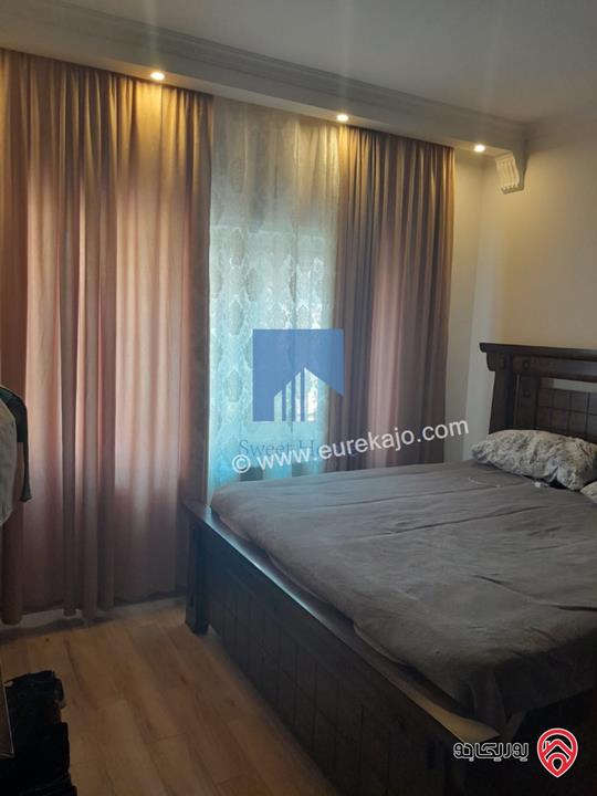 شقة أرضية مفروشة فاخرة للبيع في عمان - السابع قرب السفارة الرومانية 185م مع ترس امامي 25م تشطيب سوبر ديلوكس