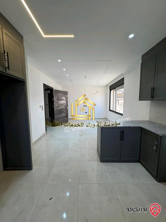 شقة جديدة لم تسكن طابق ارضي مساحة 125م للإيجار في عمان - مرج الحمام 