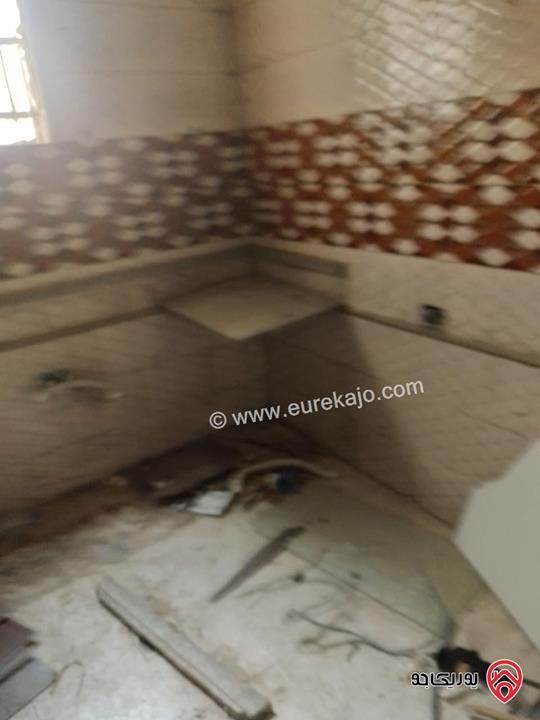 عمارة على قطعة ارض مساحة 250م للبيع في عمان - منطقة الوحدات