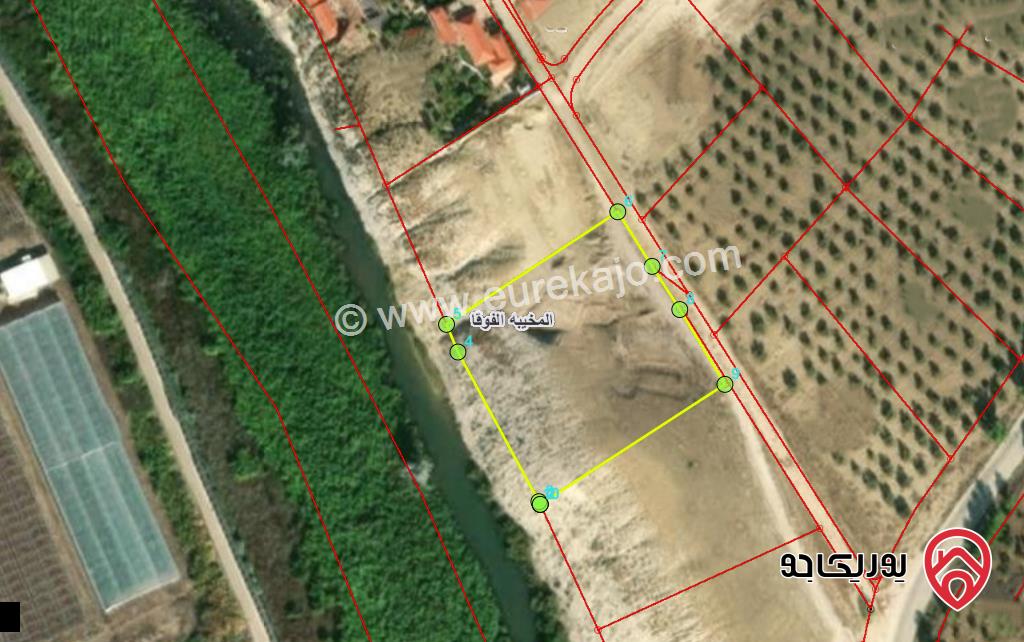 قطعة ارض مساحة 6049م للبيع في اربد على نهر اليرموك مباشرة 