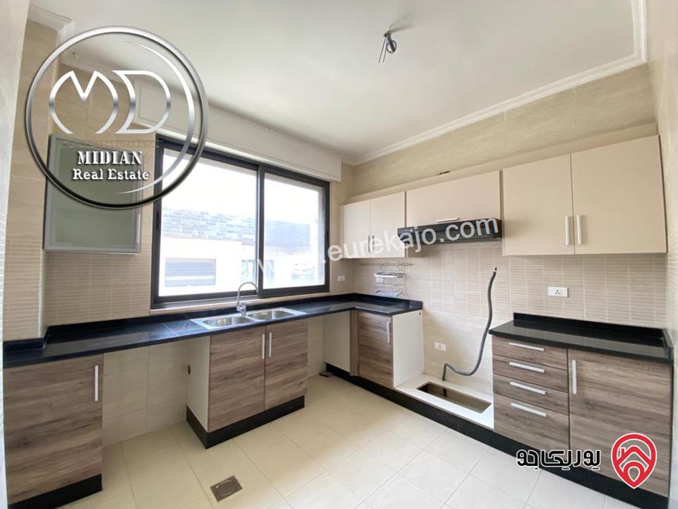 شقة ارضية فارغة للايجار في عمان - ام اذينة مساحة 150م مع ترس و حديقة 200م تشطيبات و ديكورات سوبر ديلوكس