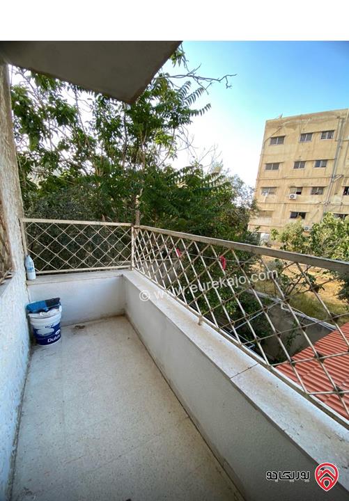 شقة طابق أرضي مساحة 95م للبيع في عمان - شارع الاستقلال