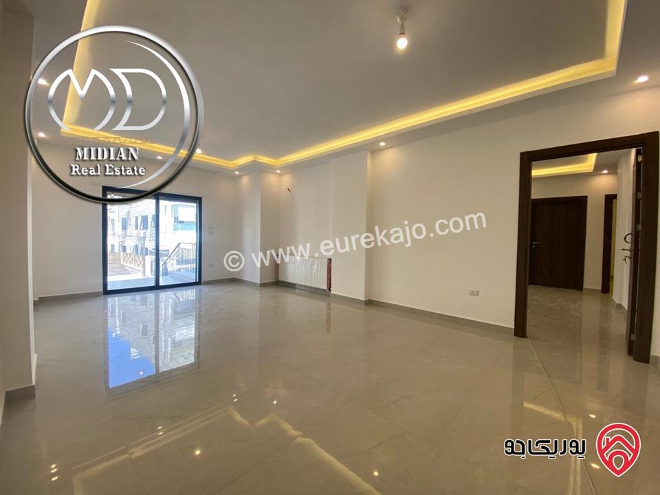 شقة شبه ارضي جديدة للبيع في عمان - تلاع العلي مساحة 200م مع ترس و حديقة 150م تشطيبات سوبر ديلوكس بسعر مميز جداً