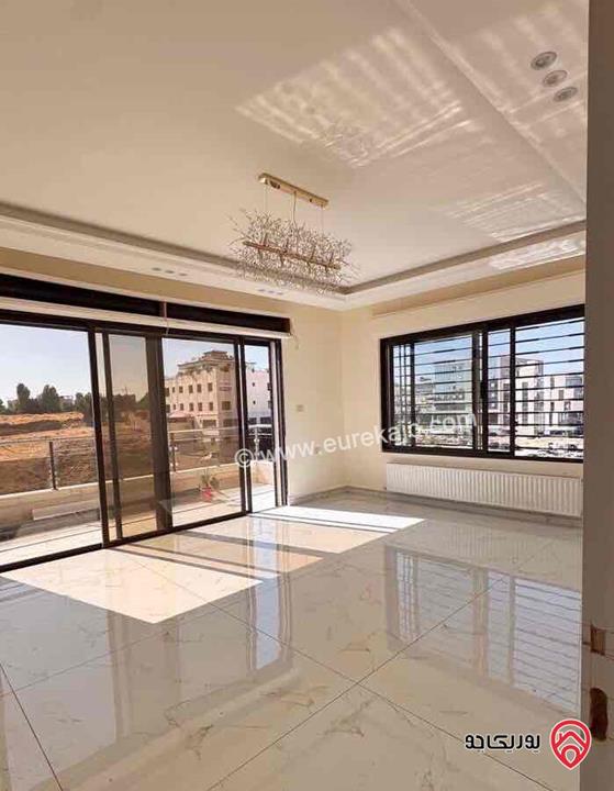 شقة فاخرة حديثة لم تسكن مساحة 210م مع ترس واسع للايجار في عمان - خلدا