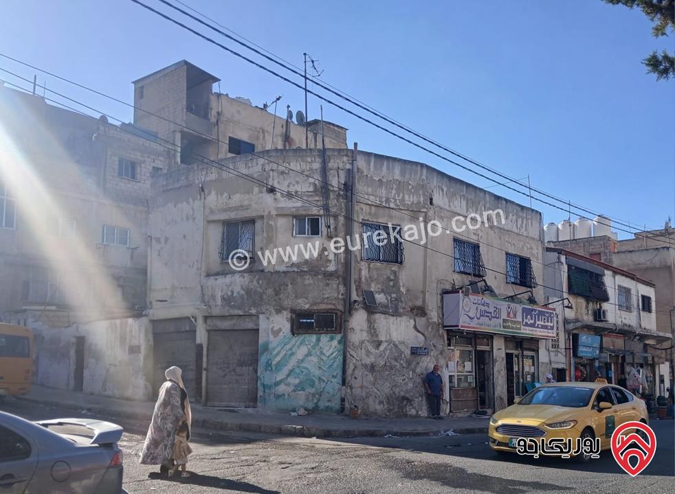 مجمع تجاري 6 ابواب تجارية و 5 شقق سكنية على أرض 531م للبيع في عمان - حي نزال